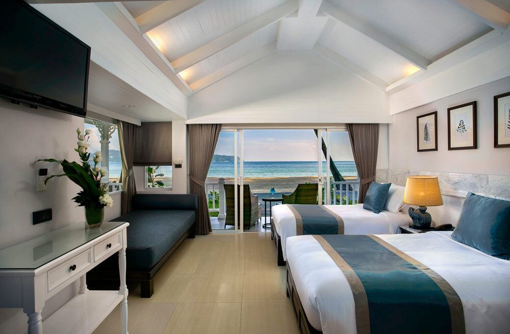 A family spending time on the private beachfront