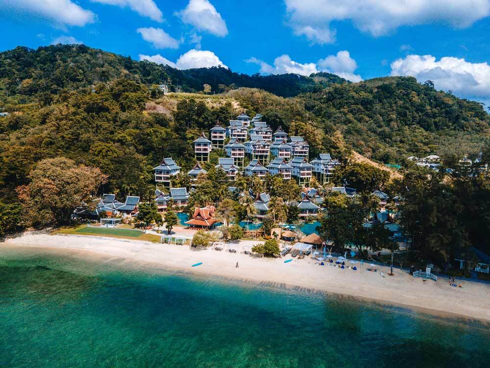 Aerial view of Thavorn Beach Village on private Nakalay Beach